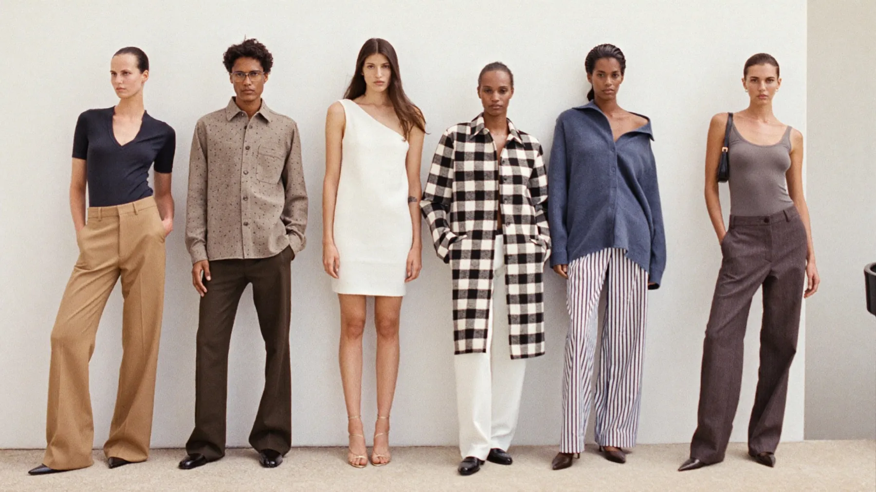 Anthroutfit lookbook: editorial group shot, tailoring, denim and knitwear worn together